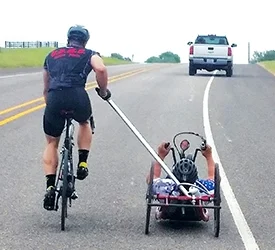 Cross-Country Cyclists Raise Money, Show Abilities of People With Disabilities