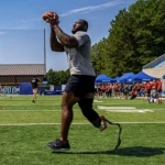 Amputee Athletes Return to the Gridiron